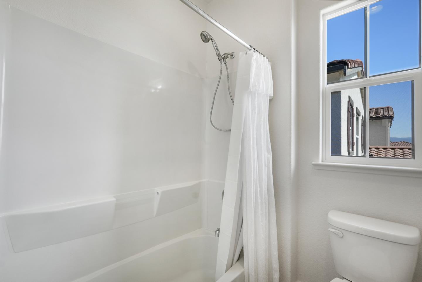 1237 Viognier Way Gilroy, CA 95020 - Photo 43 of 47 a bathroom with a shower a toilet and a shower