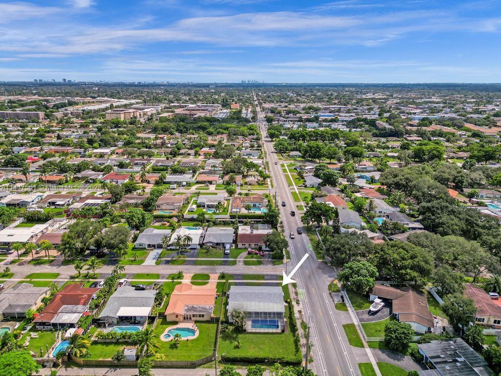 5525 Jackson Street Hollywood, FL 33021 - Photo 12 of 91 an aerial view of residential building and car parked on street side