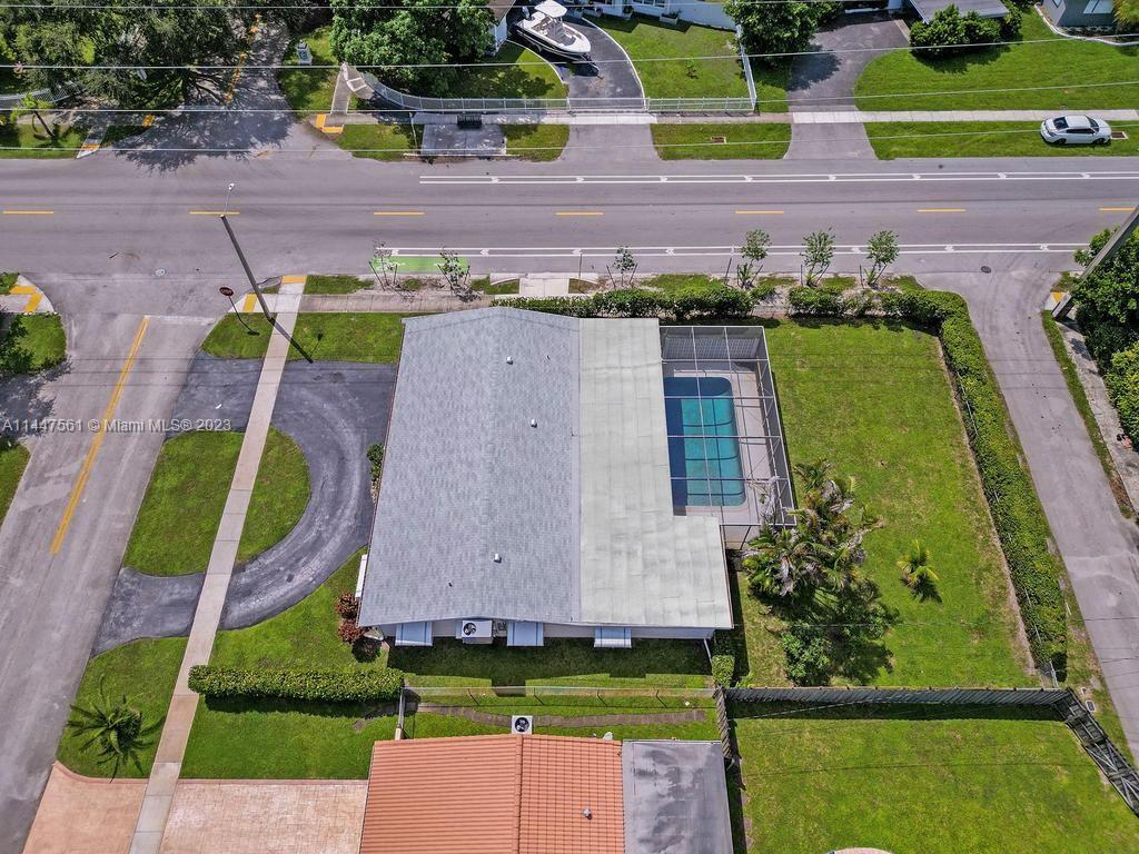 5525 Jackson Street Hollywood, FL 33021 - Photo 3 of 91 an aerial view of a house with a garden