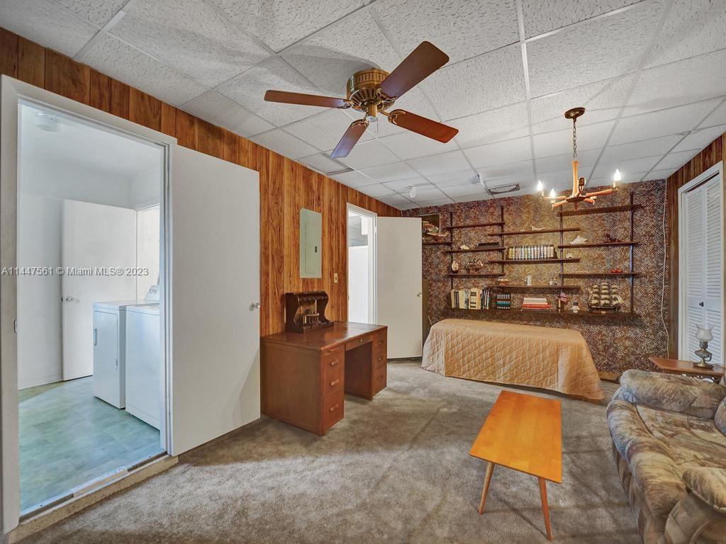 5525 Jackson Street Hollywood, FL 33021 - Photo 35 of 91 a view of a livingroom with furniture and a ceiling fan