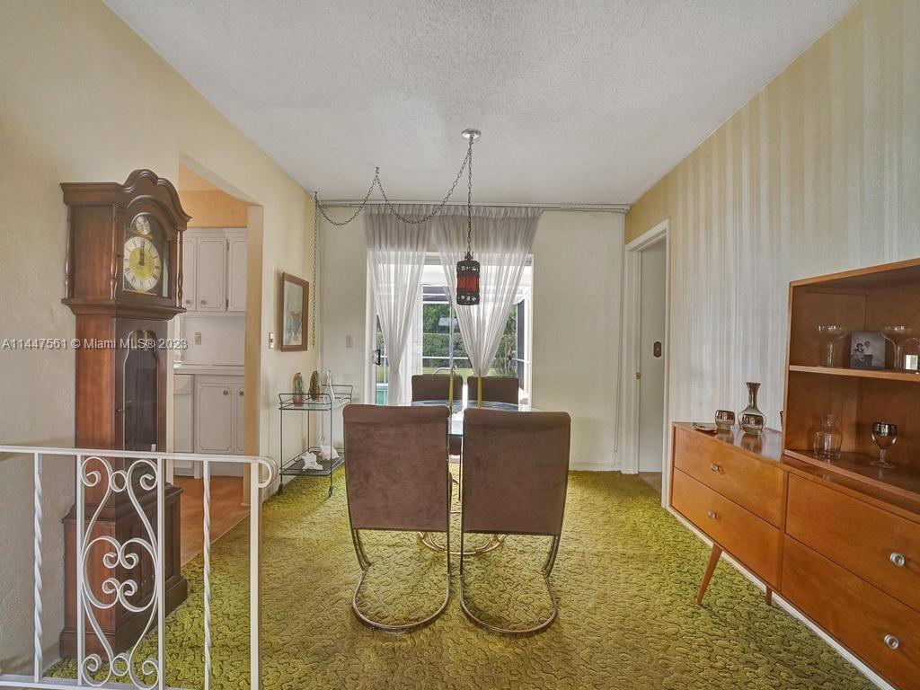 5525 Jackson Street Hollywood, FL 33021 - Photo 47 of 91 a view of a dining room with furniture