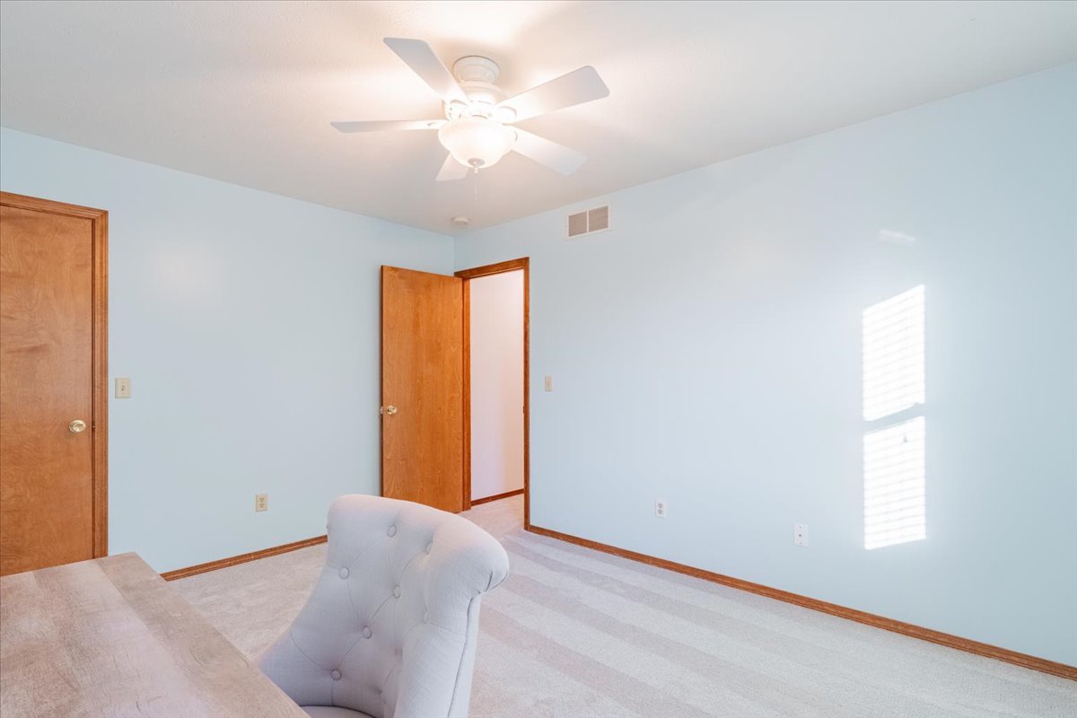 1314 Lismore Lane Normal, IL 61761 - Photo 17 of 26 a view of room with window and a ceiling fan