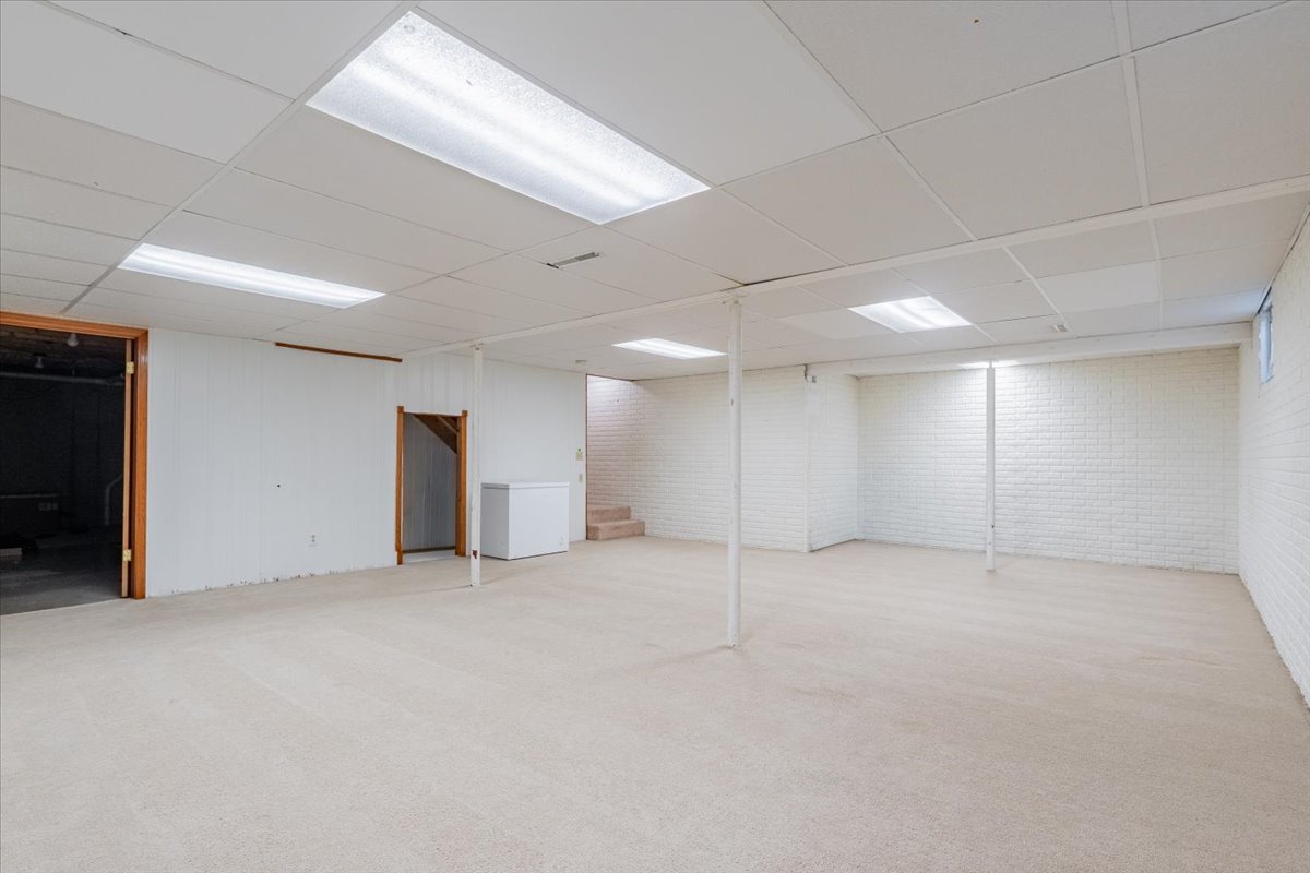 1314 Lismore Lane Normal, IL 61761 - Photo 20 of 26 an empty room with an empty space and windows