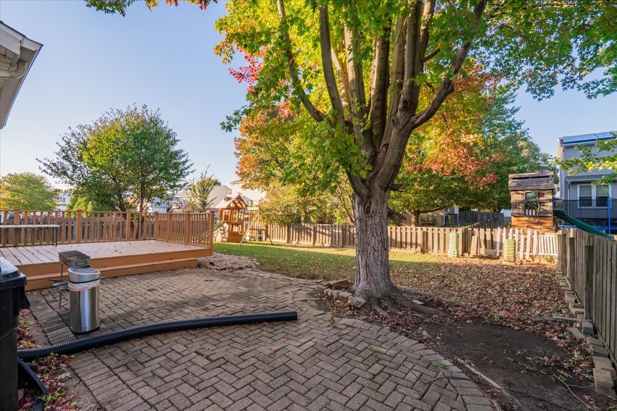 1314 Lismore Lane Normal, IL 61761 - Photo 24 of 26 a backyard of a house with lots of green space