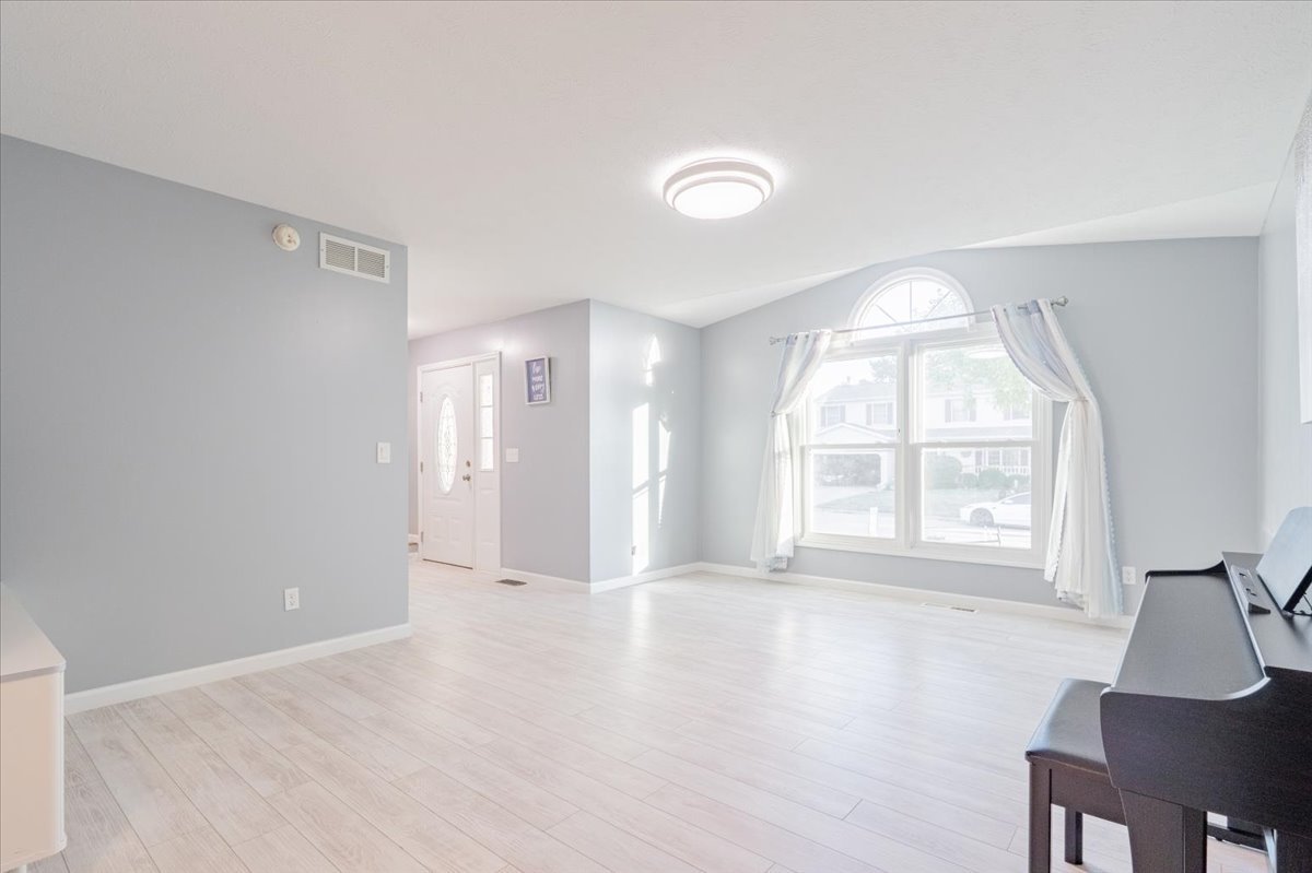1314 Lismore Lane Normal, IL 61761 - Photo 3 of 26 a view of an empty room with a window
