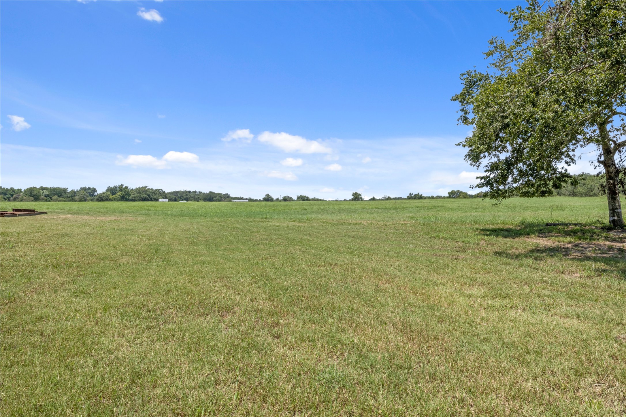 451 Pleasant Grove Road Elgin, TX 78621 - Photo 21 of 26 View of landscape with a rural view