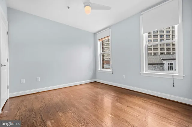 an empty room with windows