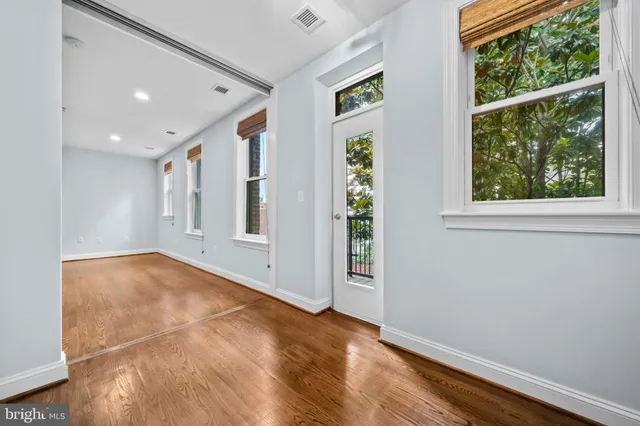 an empty room with windows