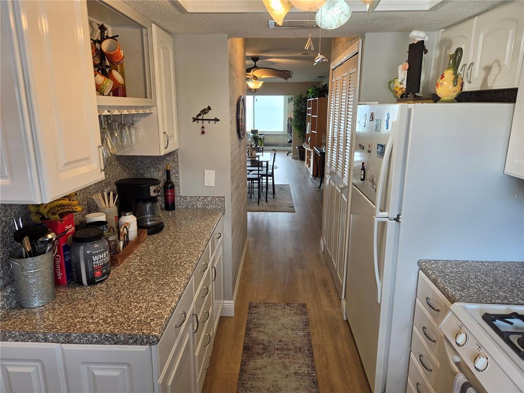 7 Dunoon Place, Unit 309 Dunedin, FL 34698 - Photo 11 of 25 a kitchen view of counter top space and stainless steel appliances