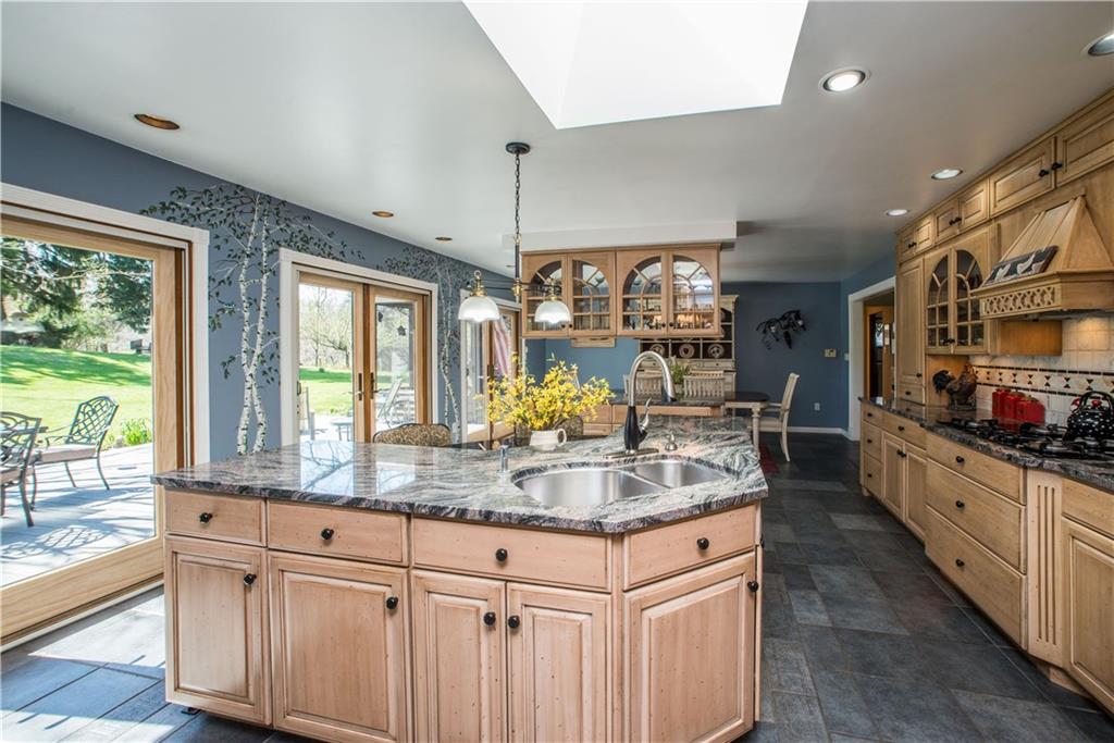443 North Lewis Run Road West Mifflin, PA 15122 - Photo 12 of 25 Cabinets galore make this kitchen a baker's dream!
