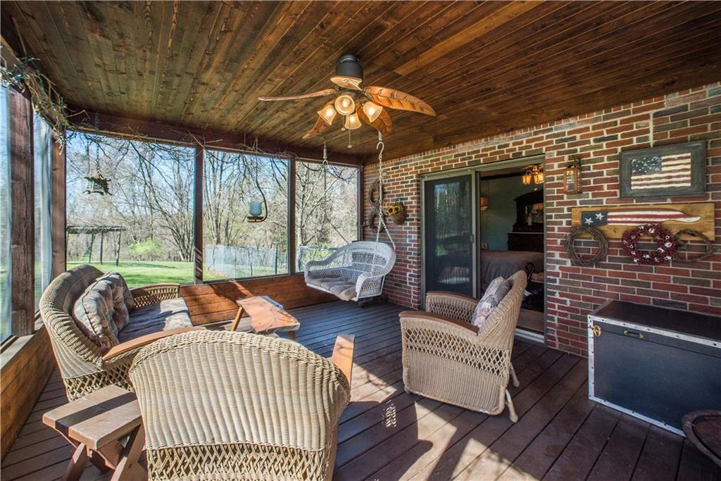 443 North Lewis Run Road West Mifflin, PA 15122 - Photo 15 of 25 The screen porch off the first bedroom is just one of three outdoor living spaces!