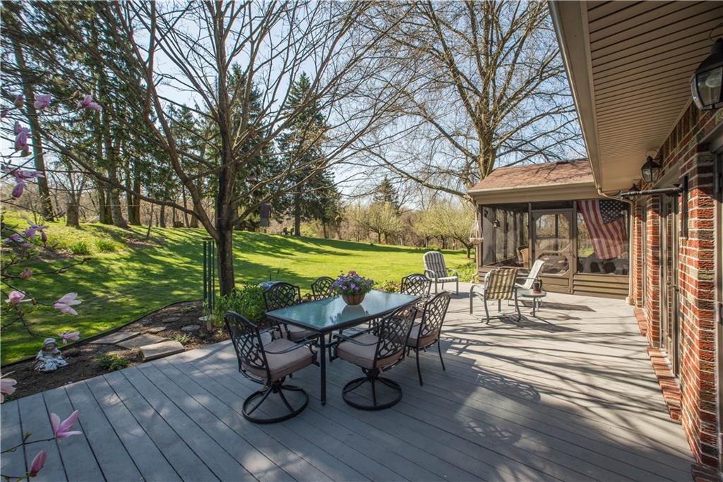 443 North Lewis Run Road West Mifflin, PA 15122 - Photo 23 of 25 This home is an outdoor lovers dream with three outdoor living spaces; patio, screened porch, and a four season room.