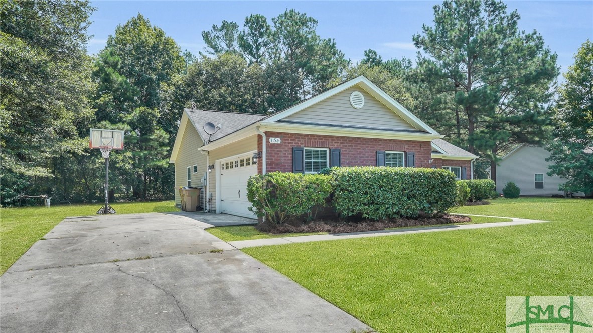 134 Buckfield Drive Rincon, GA 31326 - Photo 2 of 28 "Grass has been edited for the purposes of marketi