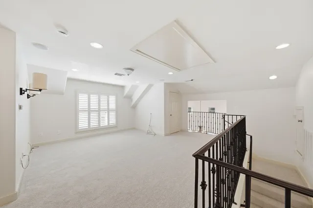 a utility room with sink dryer and washer