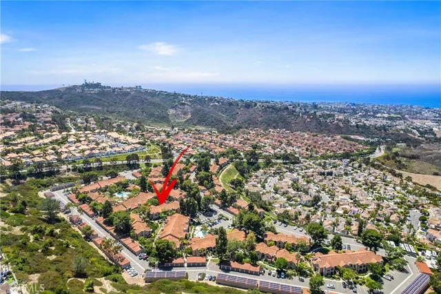 an aerial view of residential building and city view