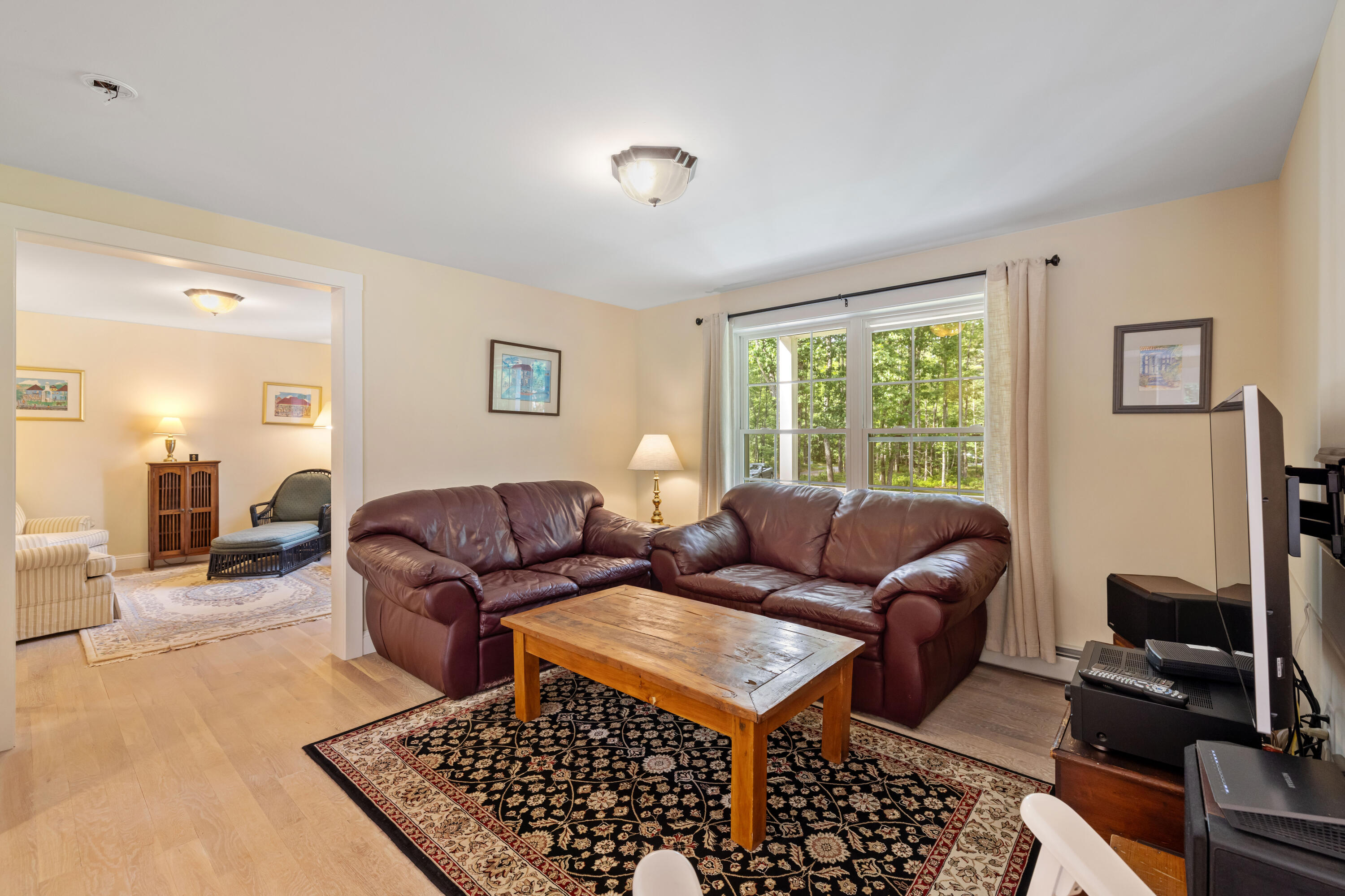 20 Maguire Road Kennebunk, ME 04043 - Photo 19 of 46 Den is beyond the living room