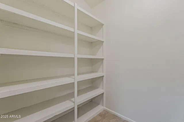 a view of balcony with furniture