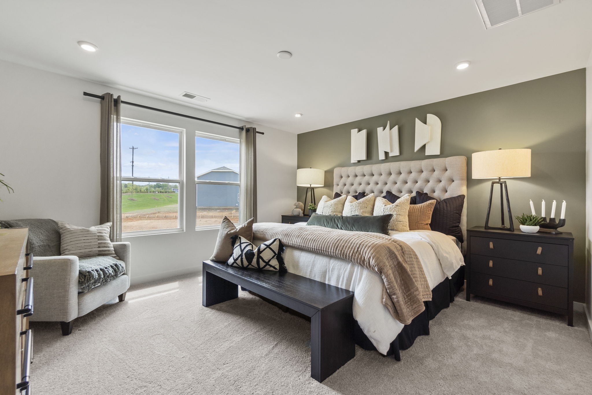 263 West Millbrook Drive Spring Hill, TN 37174 - Photo 23 of 31 a bedroom with a bed and a couch