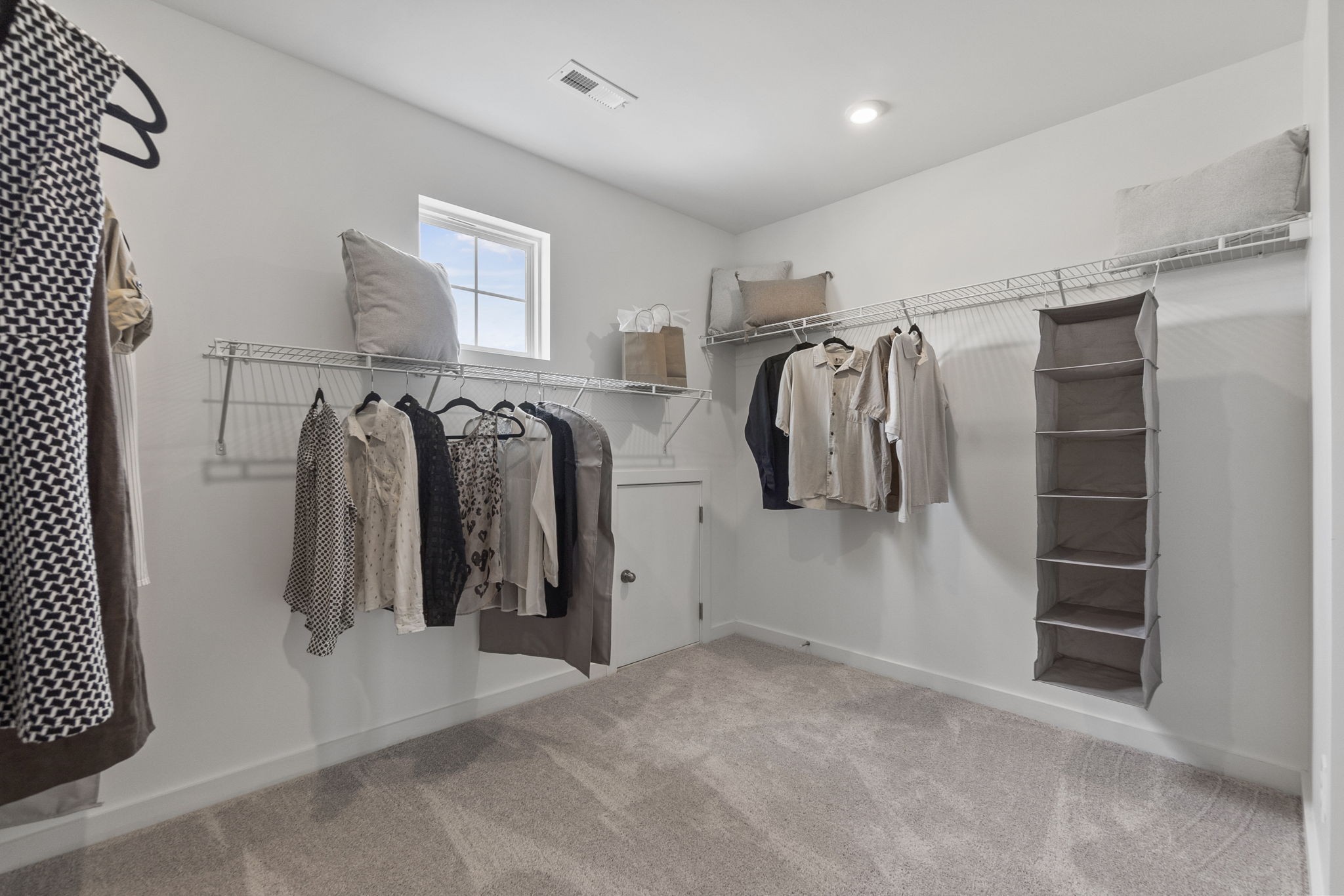 263 West Millbrook Drive Spring Hill, TN 37174 - Photo 27 of 31 a view of walk in closet with clothes and shoes