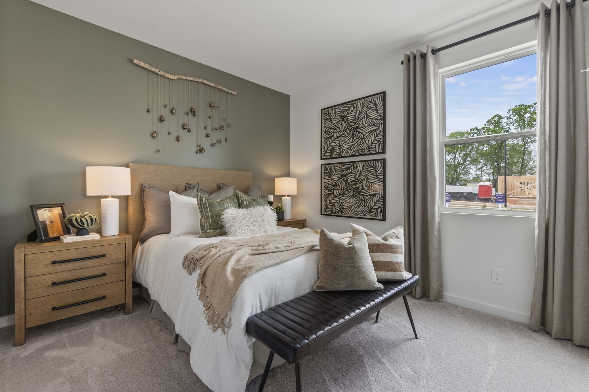 263 West Millbrook Drive Spring Hill, TN 37174 - Photo 8 of 31 a bedroom with a bed and a painting on the wall