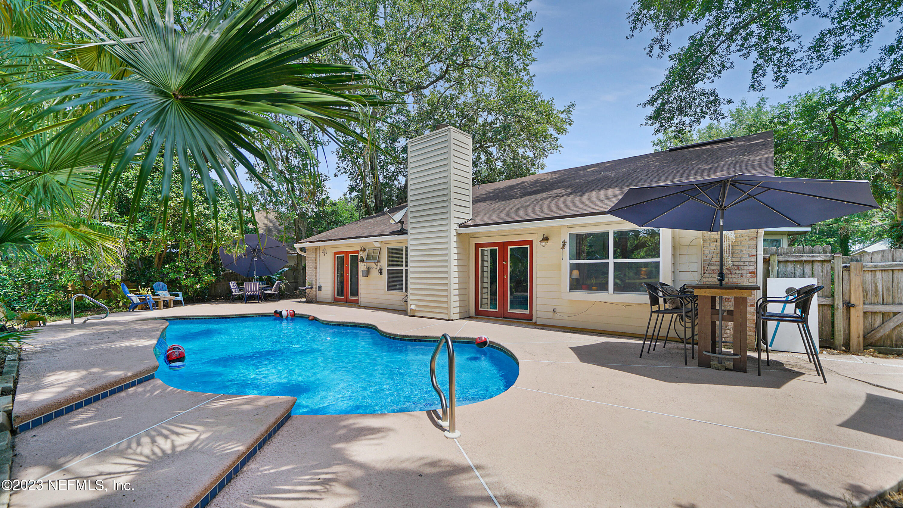 644 Hummingbird Court St. Johns, FL 32259 - Photo 1 of 36 a view of a house with swimming pool and sitting area