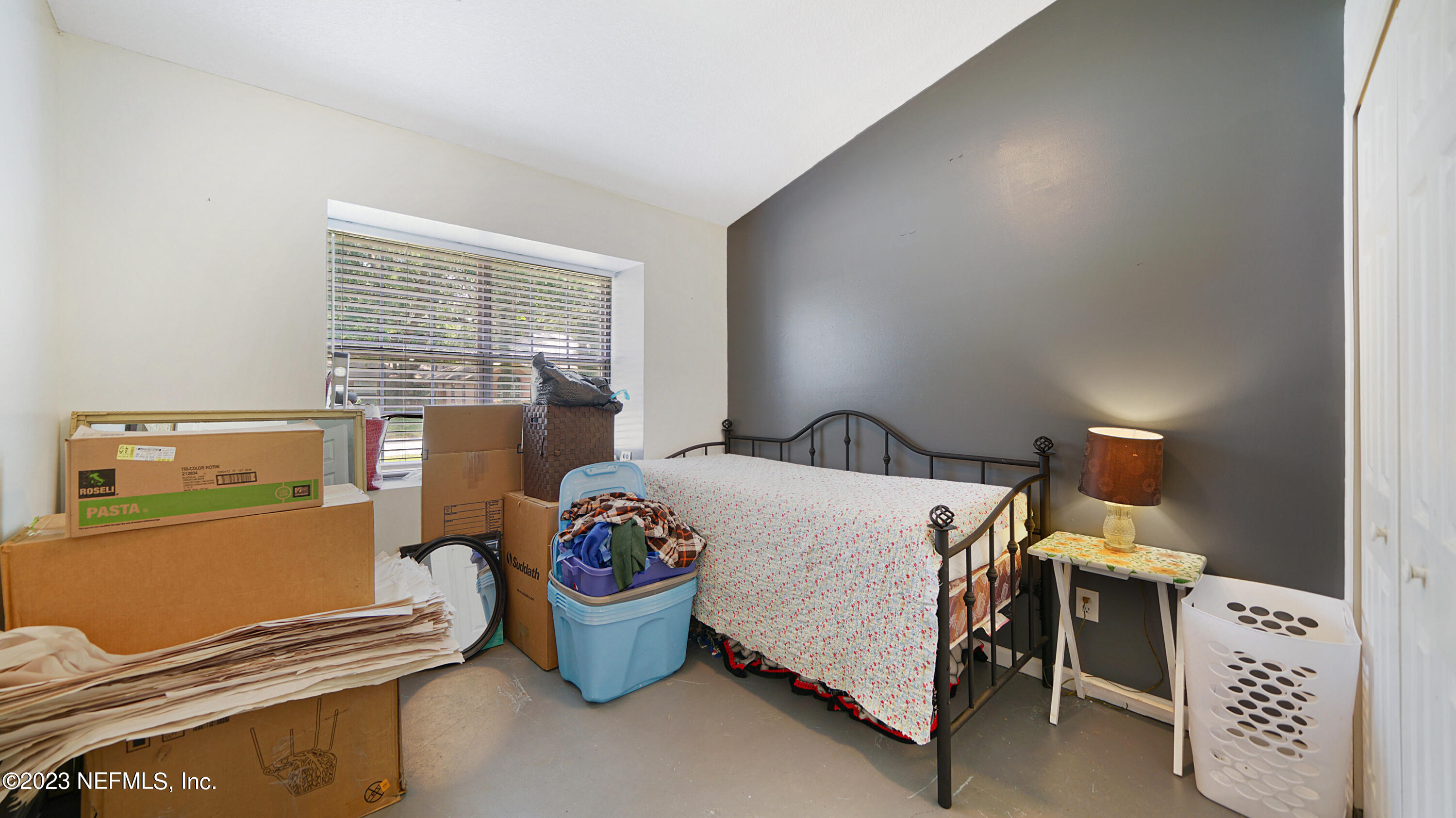 644 Hummingbird Court St. Johns, FL 32259 - Photo 11 of 36 a bed room with a bed and a window