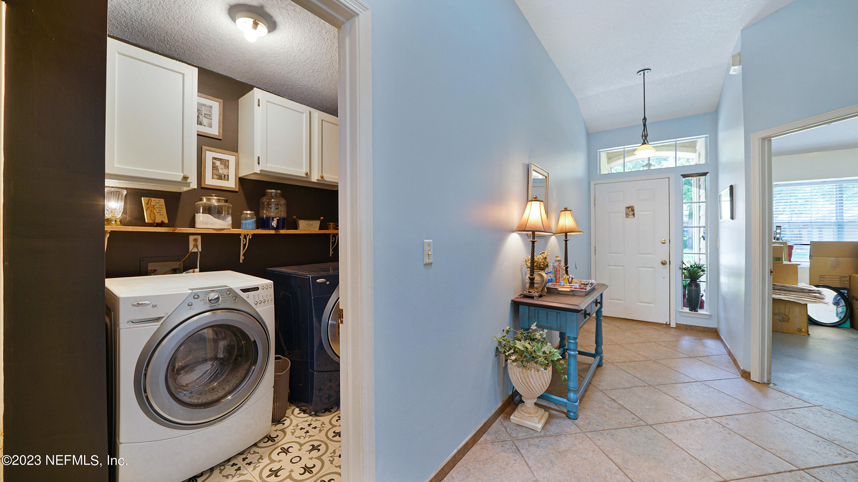 644 Hummingbird Court St. Johns, FL 32259 - Photo 15 of 36 a view of a hallway with washer and dryer
