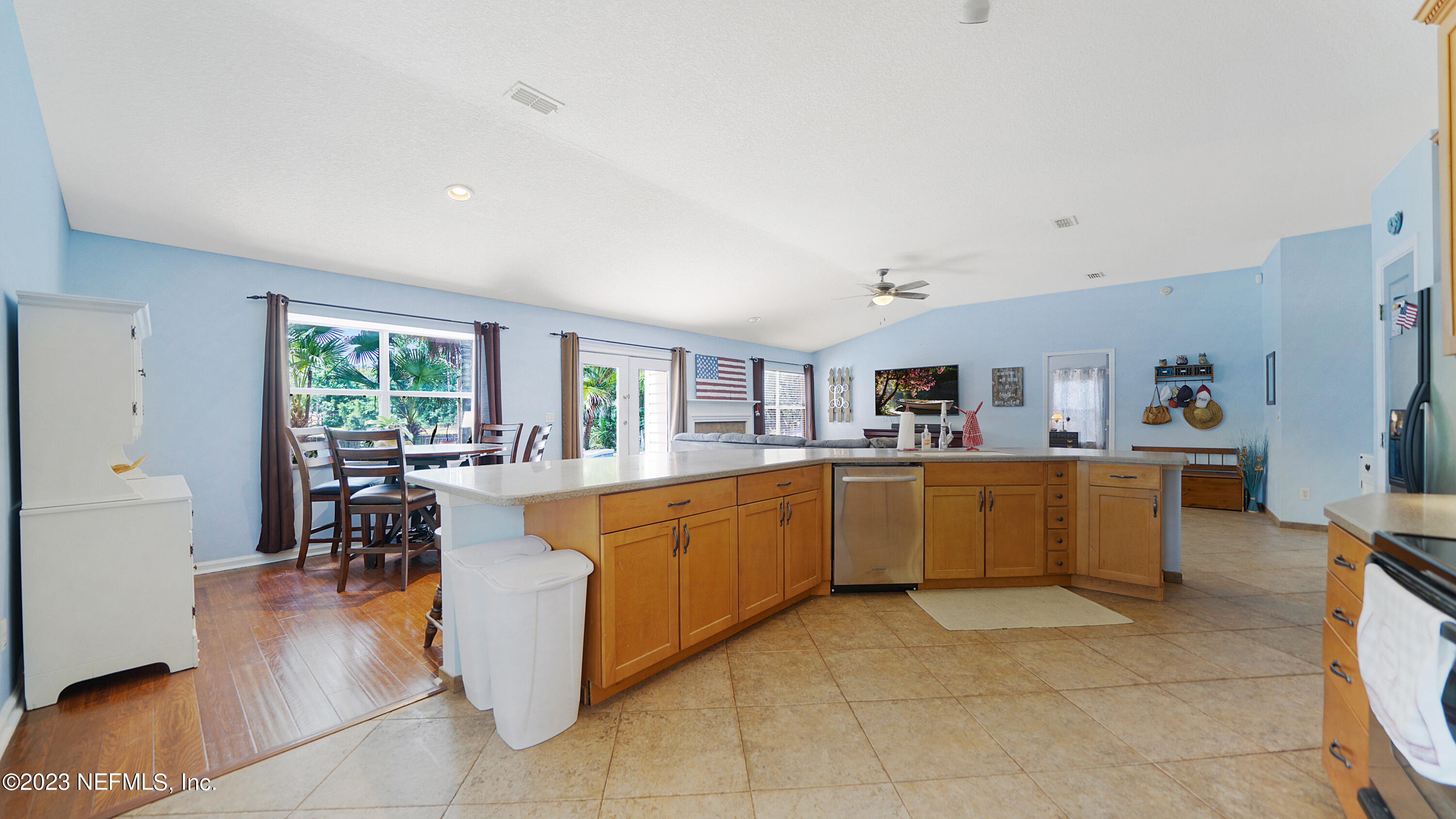 644 Hummingbird Court St. Johns, FL 32259 - Photo 19 of 36 a large white kitchen with lots of counter space and windows