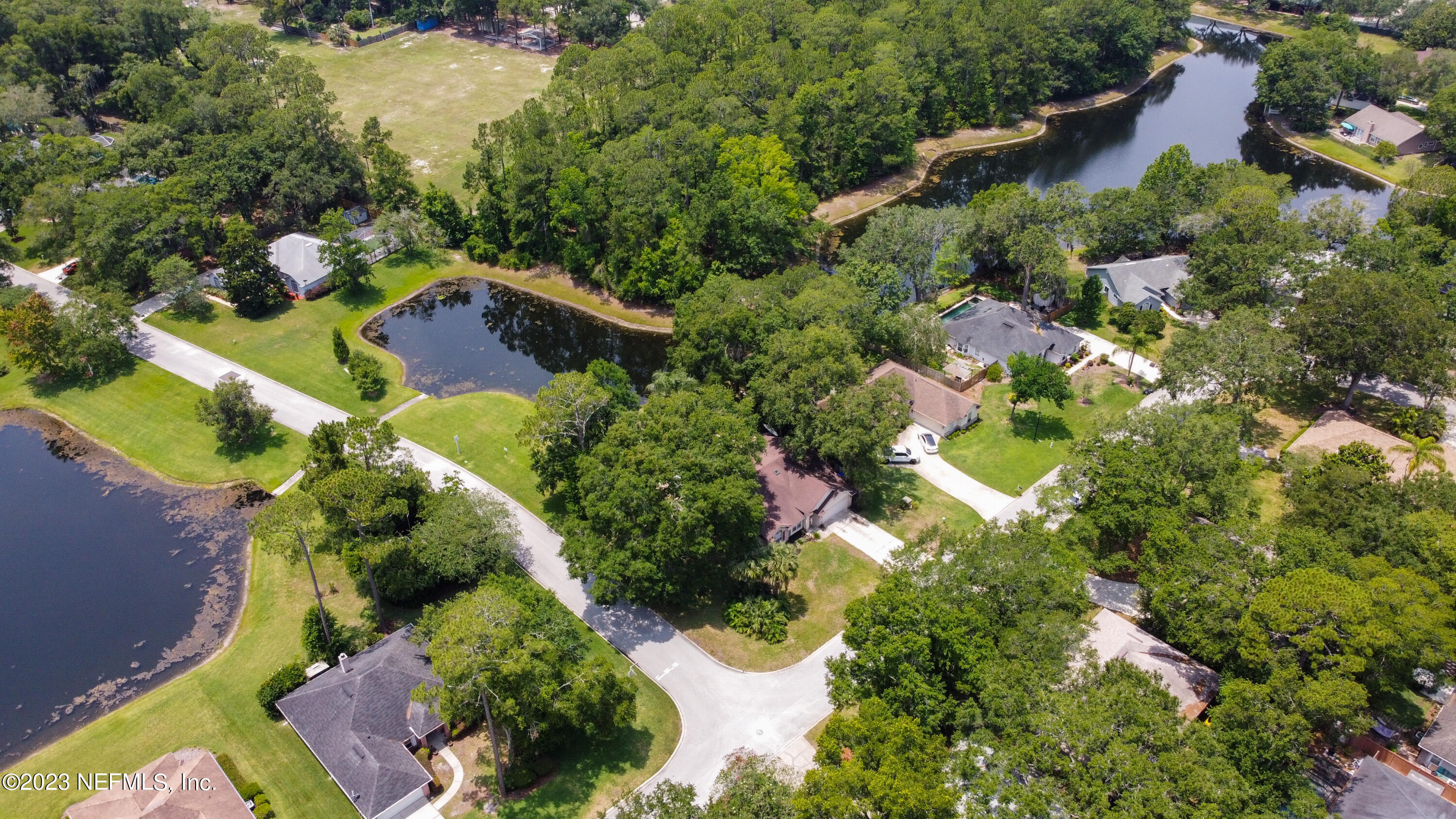 644 Hummingbird Court St. Johns, FL 32259 - Photo 33 of 36 an aerial view of residential house with outdoor space and swimming pool