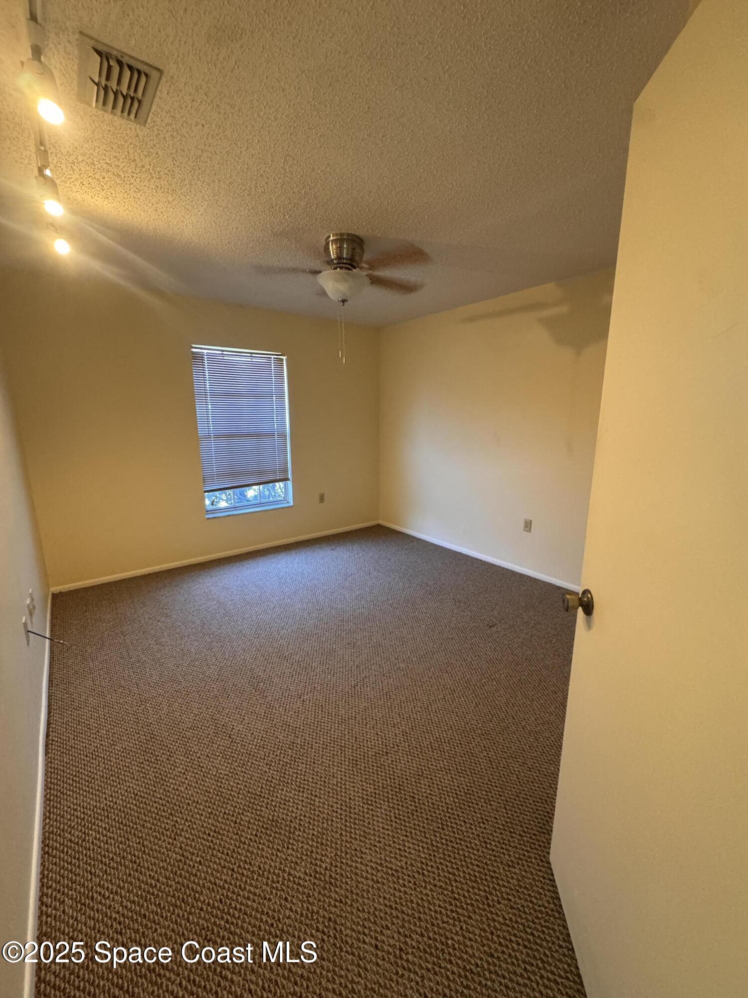 642 Altura Drive Cocoa, FL 32927 - Photo 8 of 13 a view of a room with a empty space