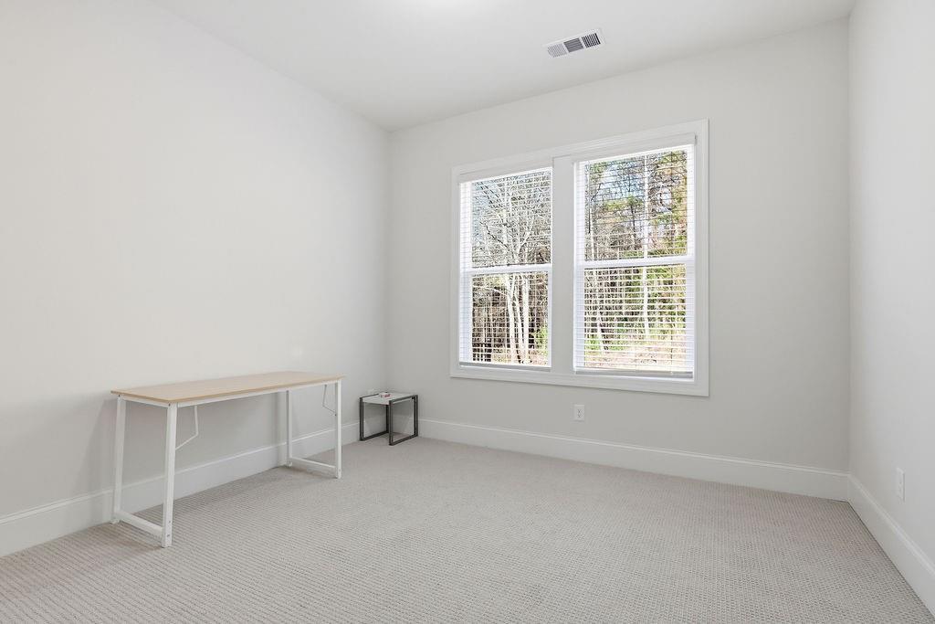 2865 Ferncliff Street Cumming, GA 30028 - Photo 20 of 41 an empty room with a window