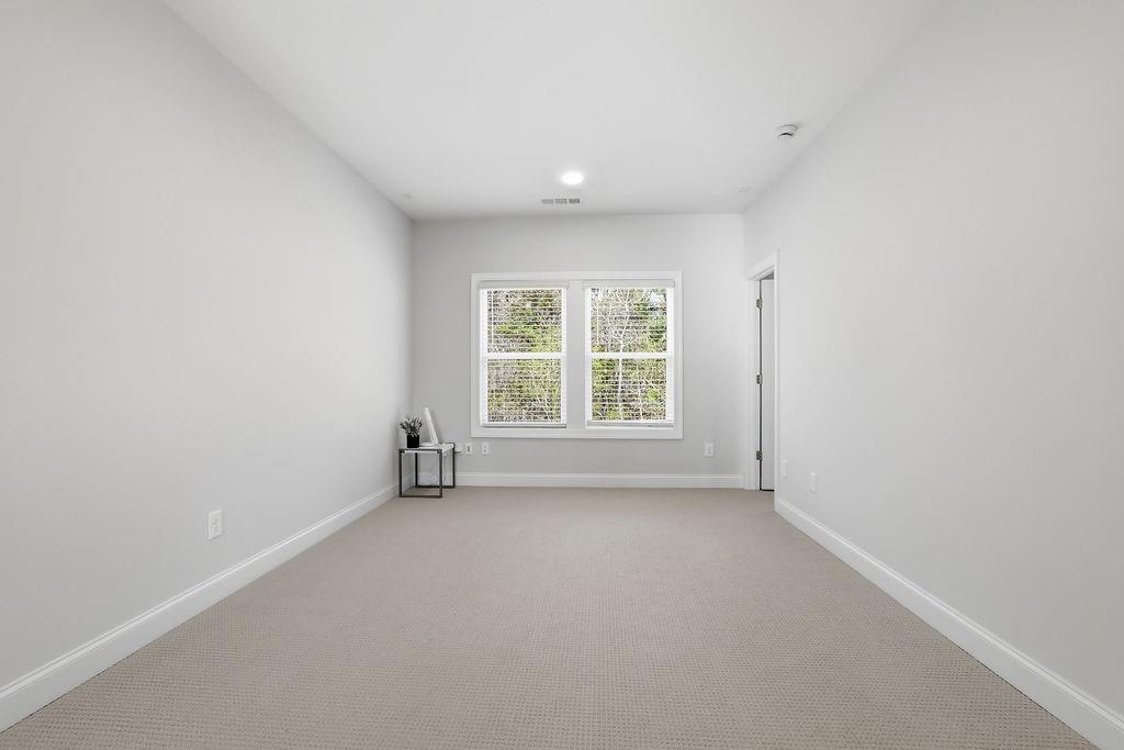 2865 Ferncliff Street Cumming, GA 30028 - Photo 24 of 41 an empty room with windows