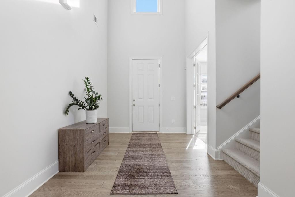 2865 Ferncliff Street Cumming, GA 30028 - Photo 4 of 41 a view of entryway with wooden floor