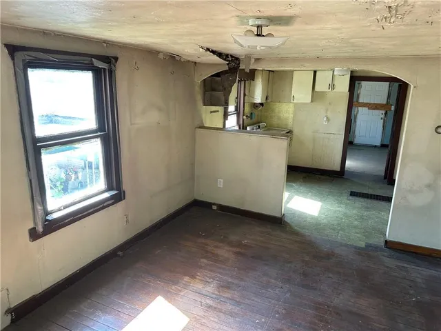 a kitchen with sink cabinets and window