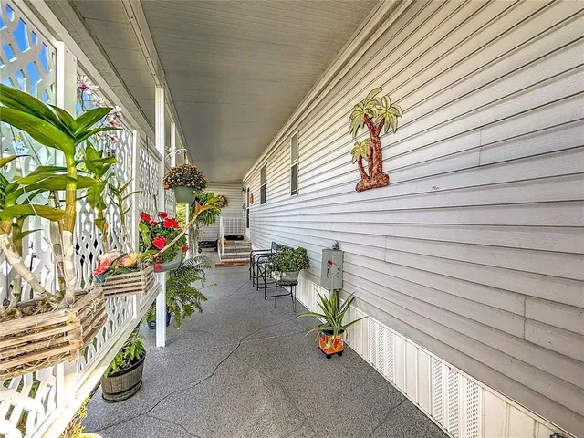 a living room with furniture window and wooden floor