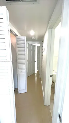 a view of living room and utility room