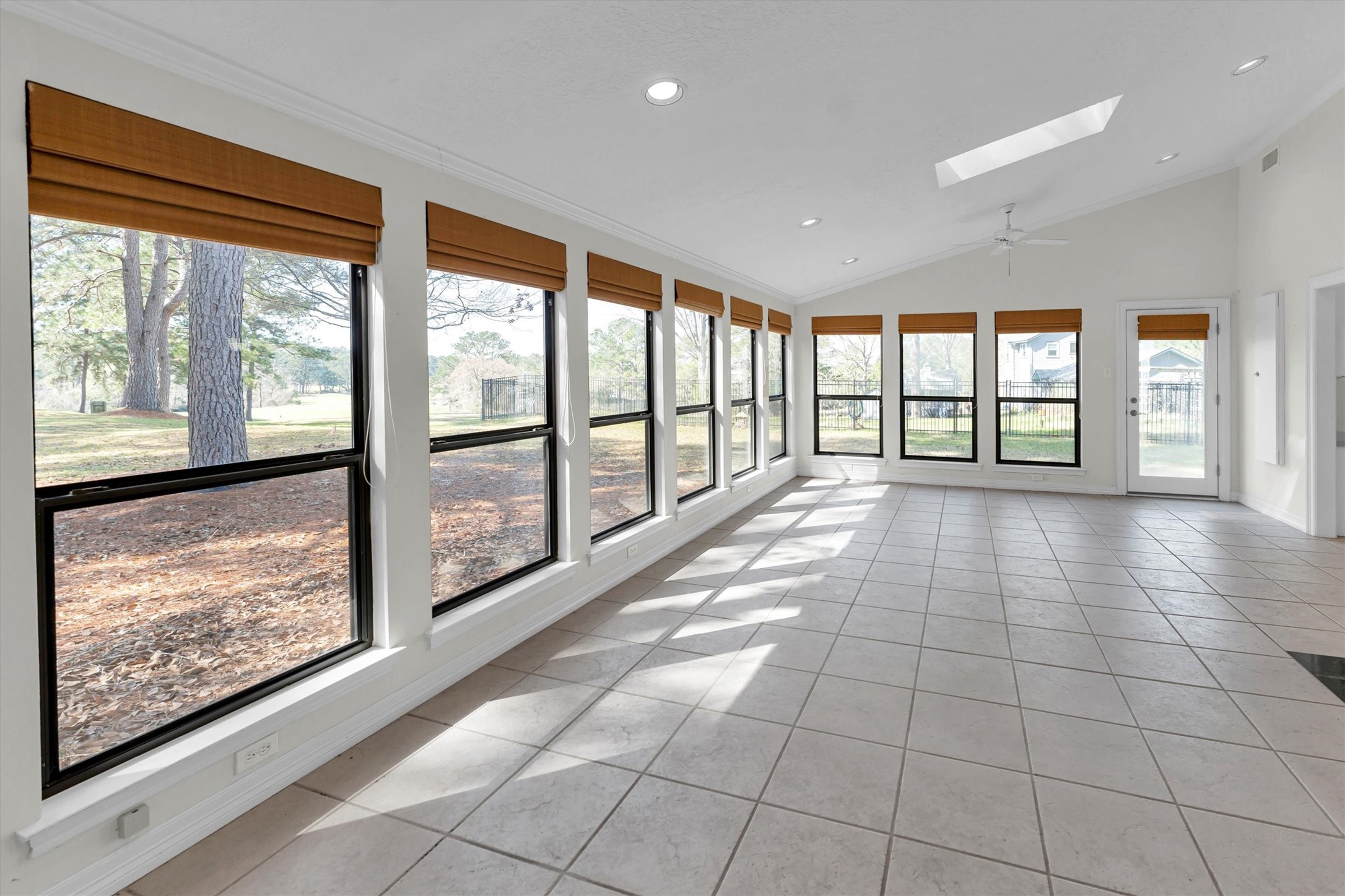 22509 Pebble Beach Way Point Blank, TX 77364 - Photo 12 of 50 a view of an entryway with a floor to ceiling window and an empty room
