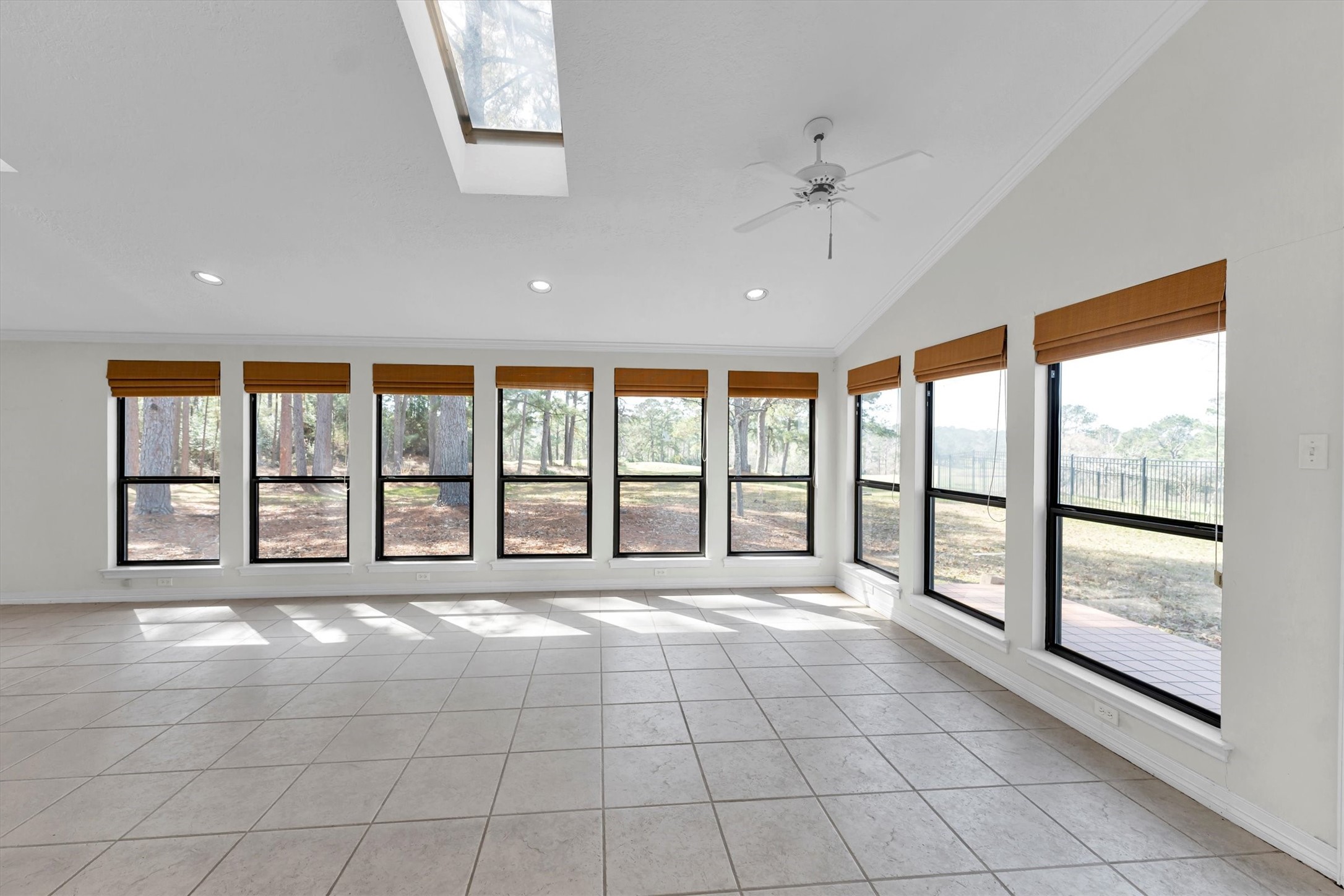 22509 Pebble Beach Way Point Blank, TX 77364 - Photo 16 of 50 a view of an empty room with a large window