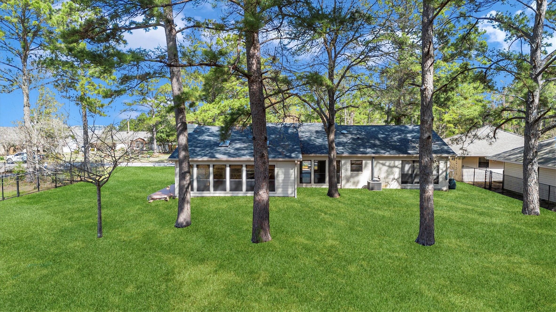 22509 Pebble Beach Way Point Blank, TX 77364 - Photo 38 of 50 a view of house with a backyard