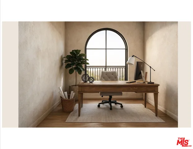 a living room with a couch a rug and a window