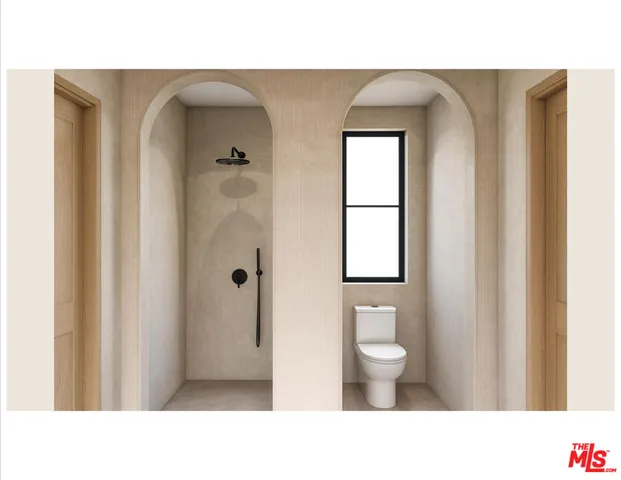 a bathroom with a toilet and a sink