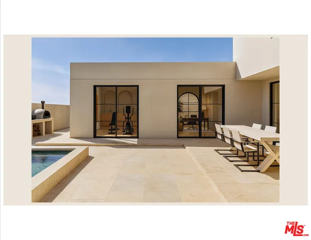 a view of living room with furniture and window