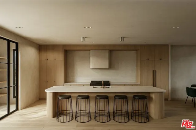 a dinning table and chairs in a room