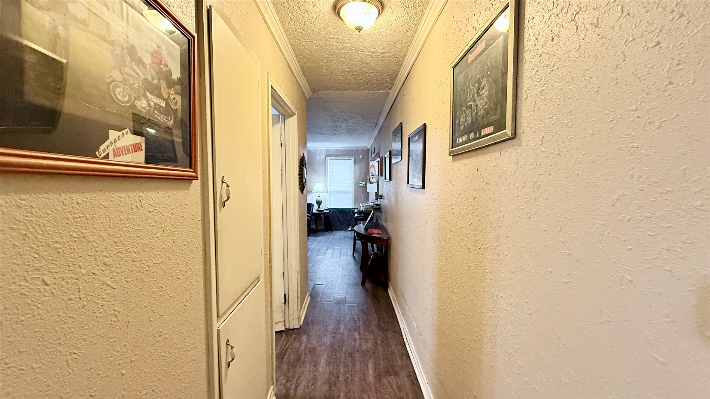 503 Honeysuckle Drive La Marque, TX 77568 - Photo 11 of 24 a view of a hallway with wooden floor and staircase
