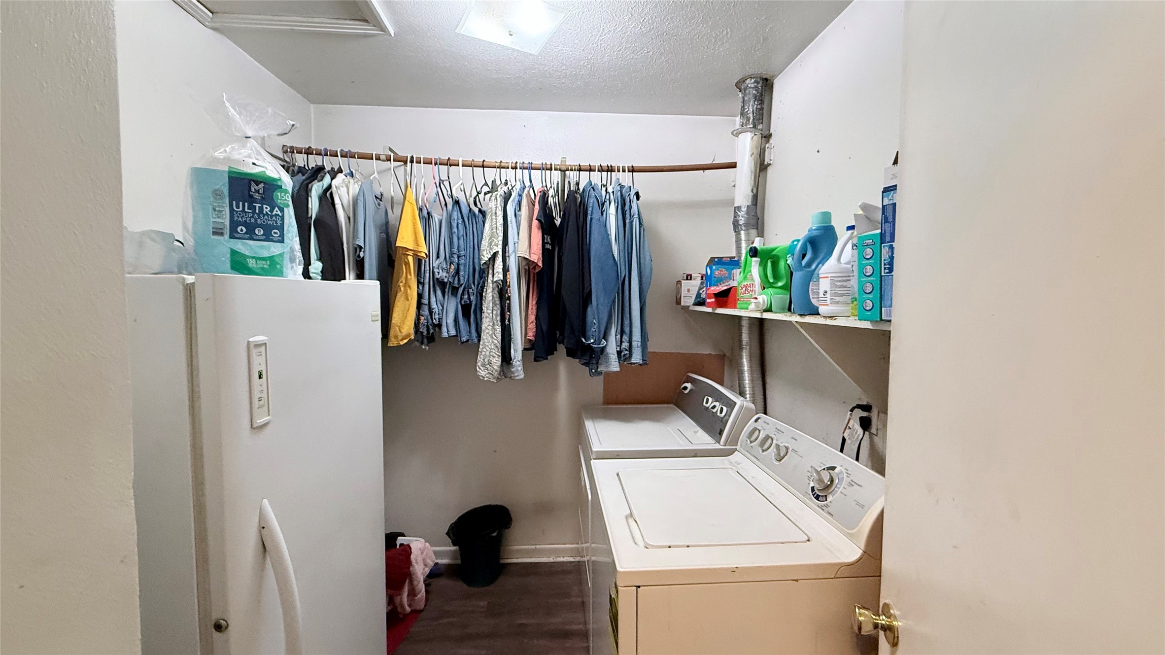 503 Honeysuckle Drive La Marque, TX 77568 - Photo 12 of 24 a view of walk in closet with clothes and shoes