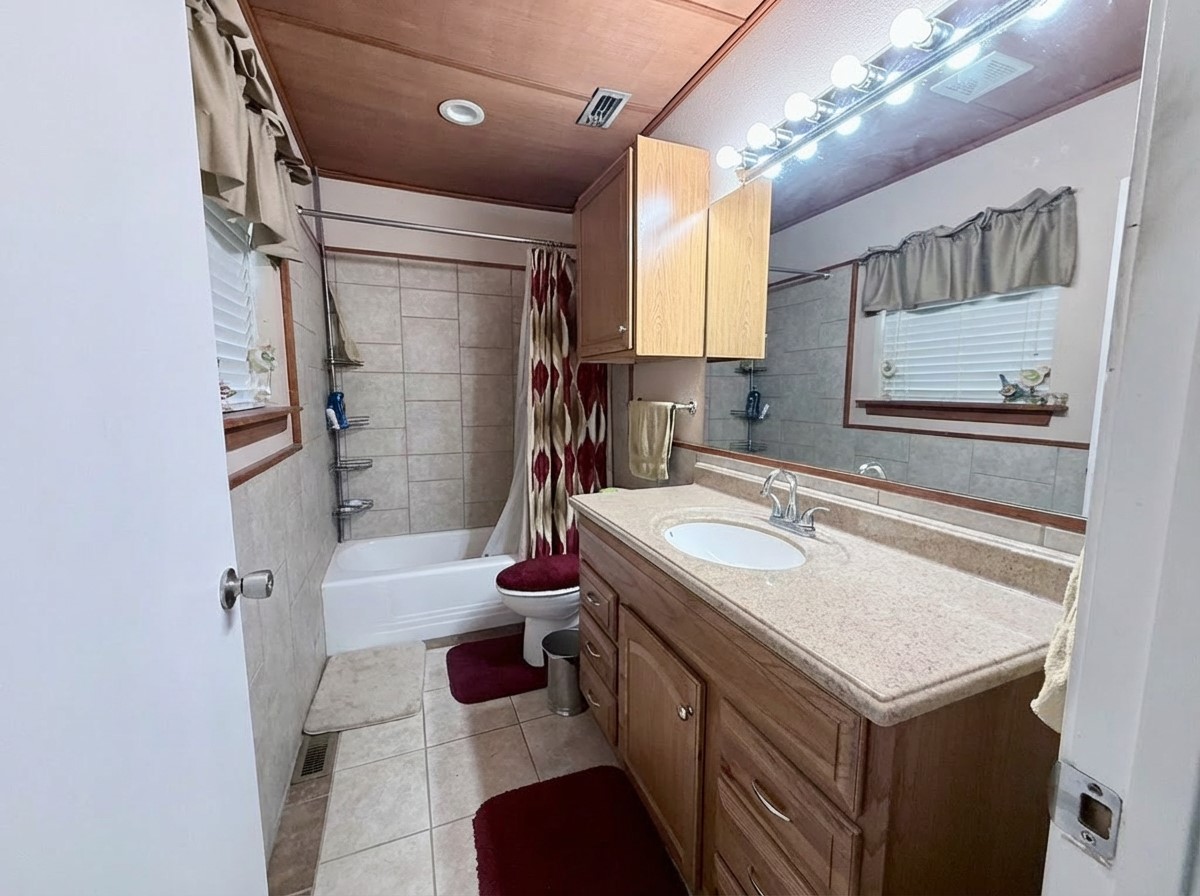 503 Honeysuckle Drive La Marque, TX 77568 - Photo 16 of 24 a bathroom with a sink toilet and shower