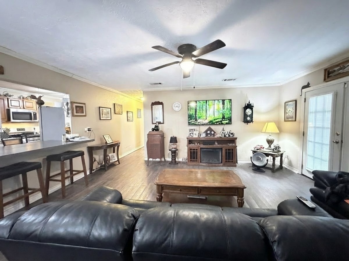 503 Honeysuckle Drive La Marque, TX 77568 - Photo 9 of 24 a living room with furniture and a large window