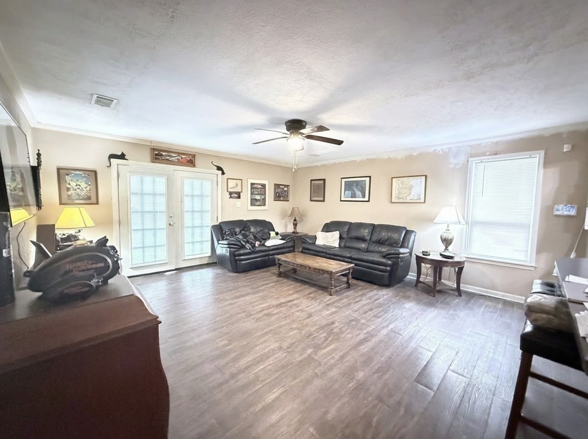 503 Honeysuckle Drive La Marque, TX 77568 - Photo 10 of 24 a living room with furniture window and wooden floor