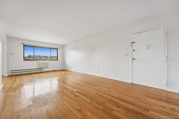a bathroom with a granite countertop toilet a sink and a bathtub