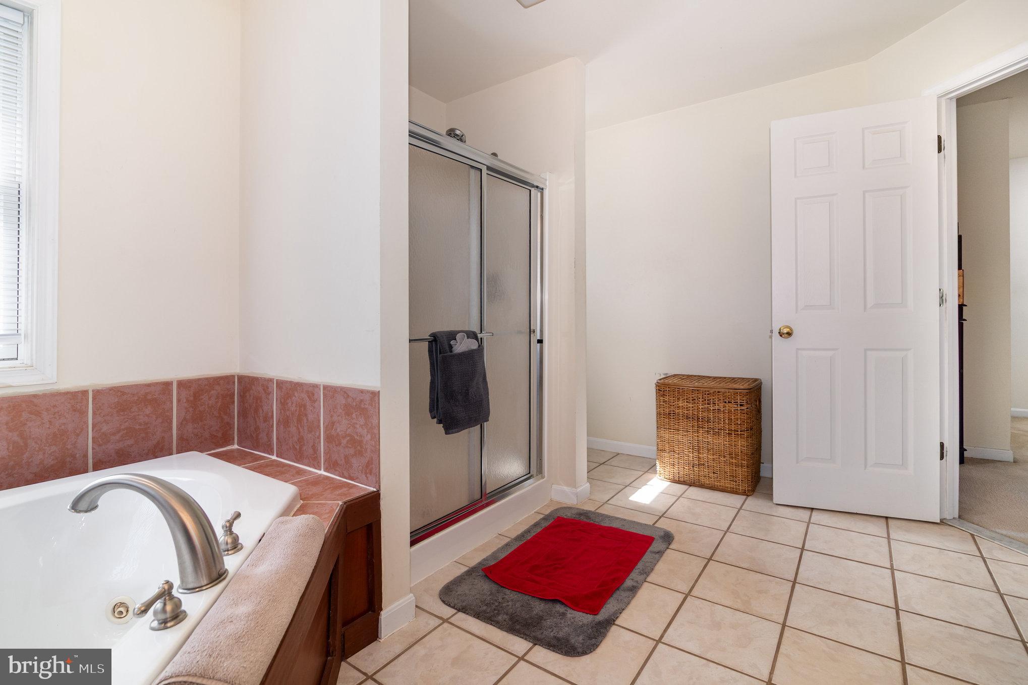 7 Beverly Court Carlisle, PA 17015 - Photo 12 of 25 Serene bathroom retreat with modern amenities.